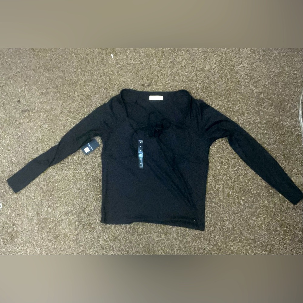 Luck Brand: Los Angeles, long sleeve, ribbed, black, with “Bow tie” in front.